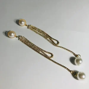 Long Pearl drop earrings with pearl pendulum style